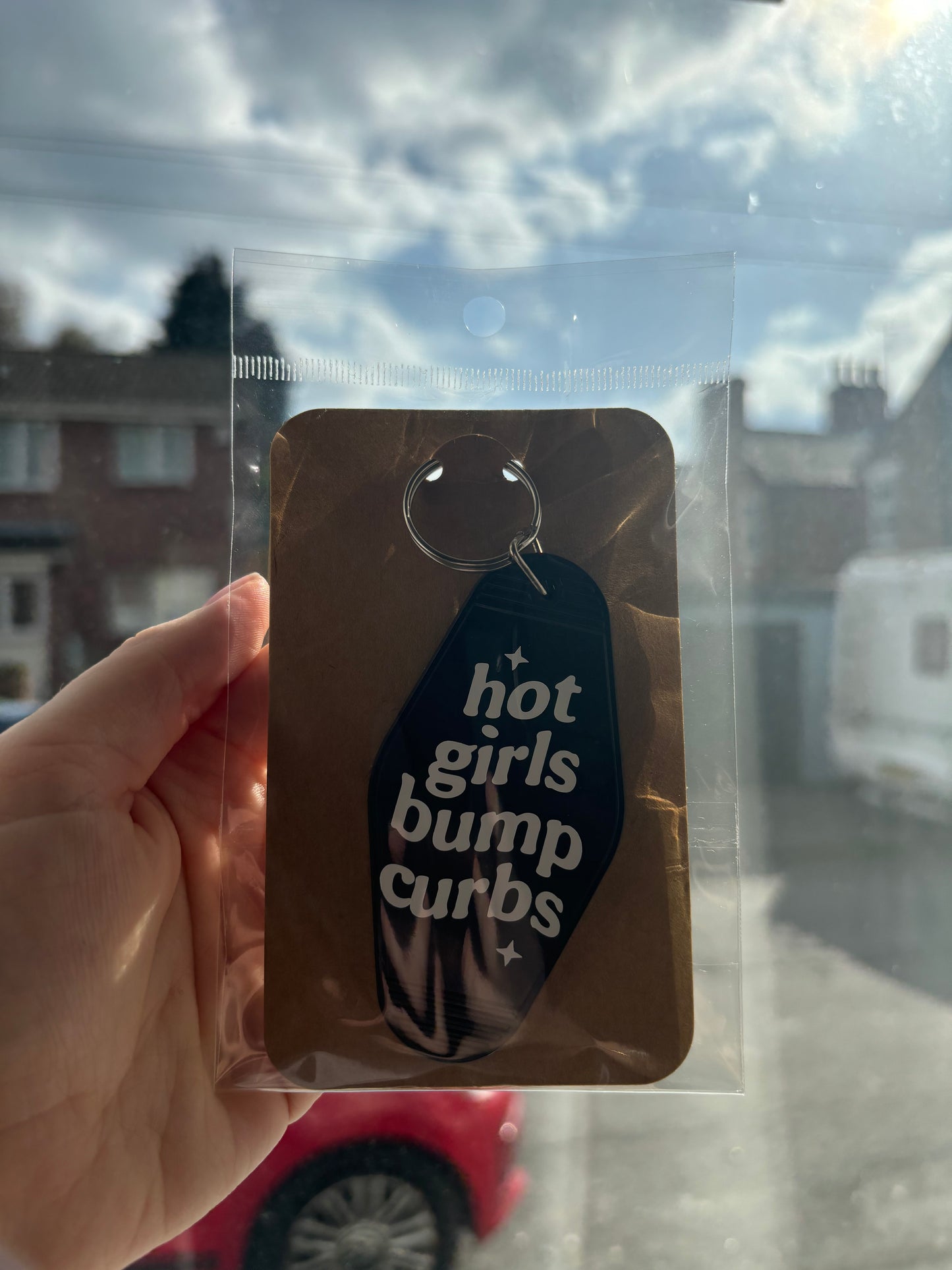 Hot girls hit curbs keychain