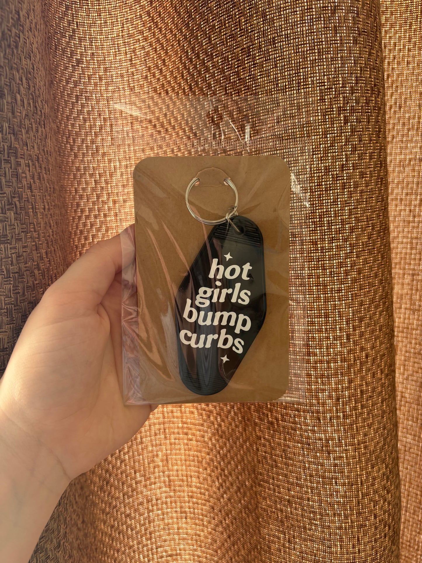 Hot girls hit curbs keychain