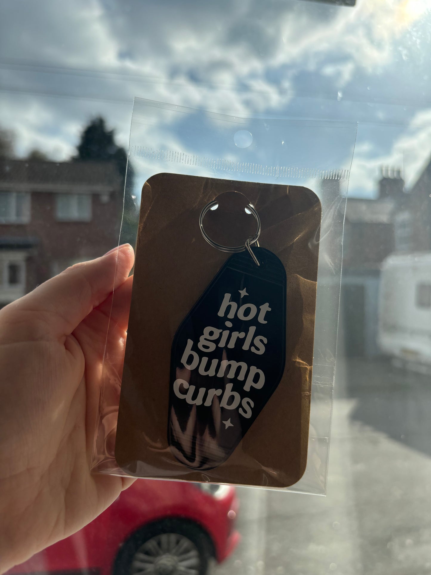 Hot girls hit curbs keychain